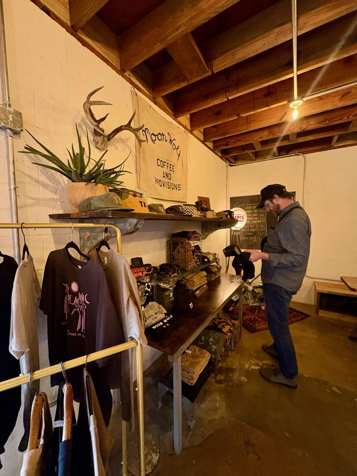 Moon Wolf apparel rack and antler wall decor